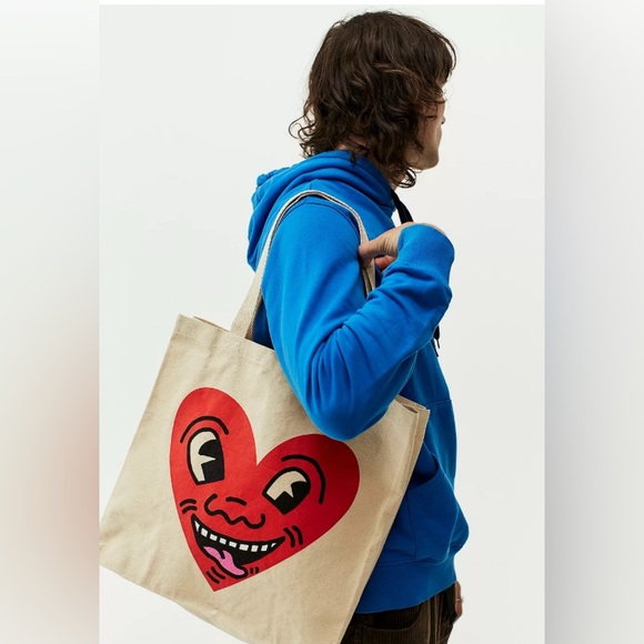 Ripple Junction Featuring Keith Haring's Iconic Red Heart Face Graphic Tote Bag - Picture 1 of 6